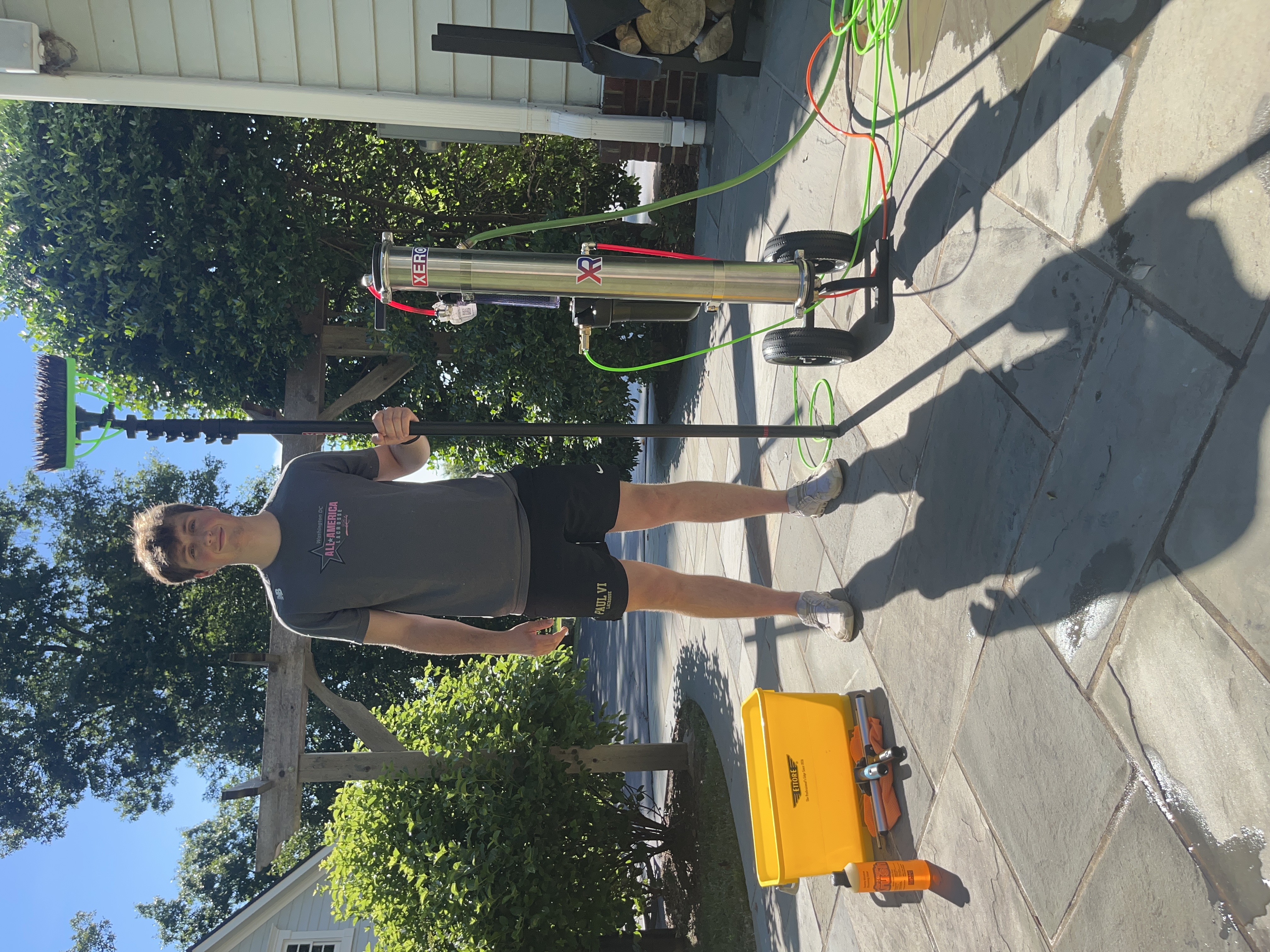Blue Line Co. cleaning windows